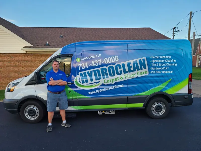 David Laton standing beside the HydroClean van in a driveway
