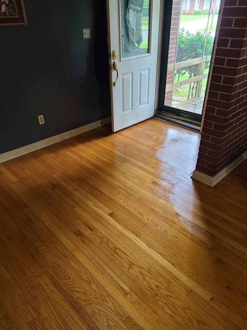 Oak hardwood floor at a front door after cleaning