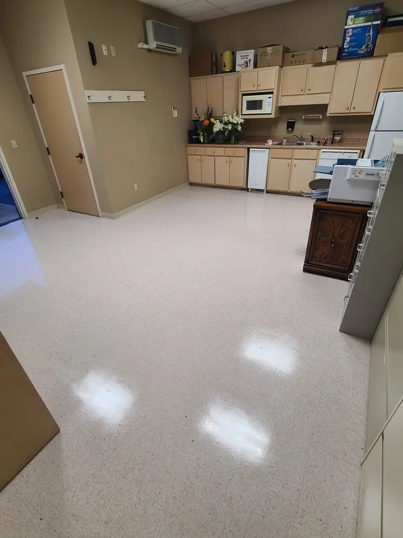 VCT break room floor, glossy after strip and wax