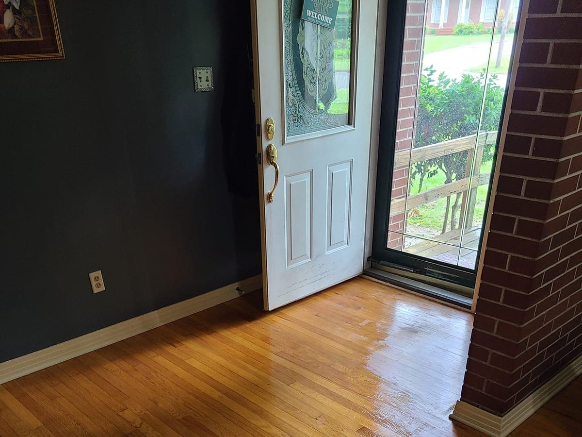 Oak hardwood floor at a front door after cleaning