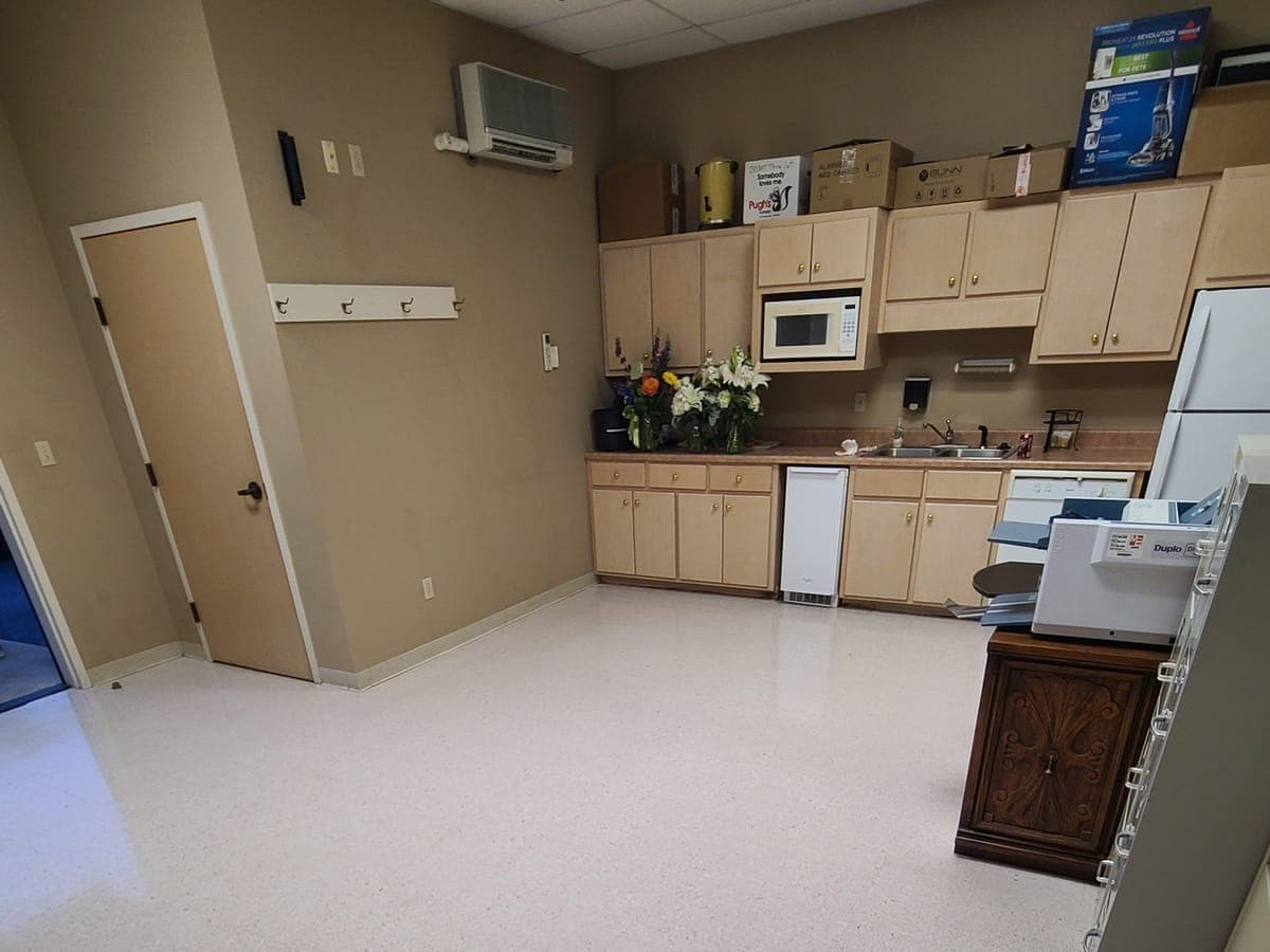 VCT break room floor, glossy after strip and wax